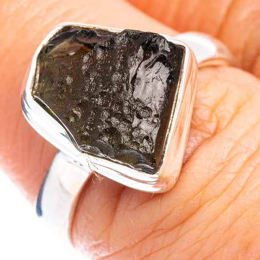 Moldavite stone ring in sterling silver with dark brown, metallic bezel