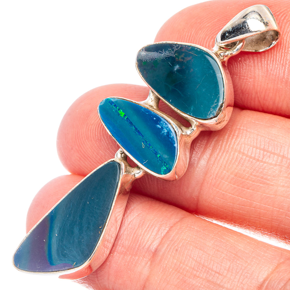 Sterling silver opal doublet pendant with three teardrop blue stones, bail loop.