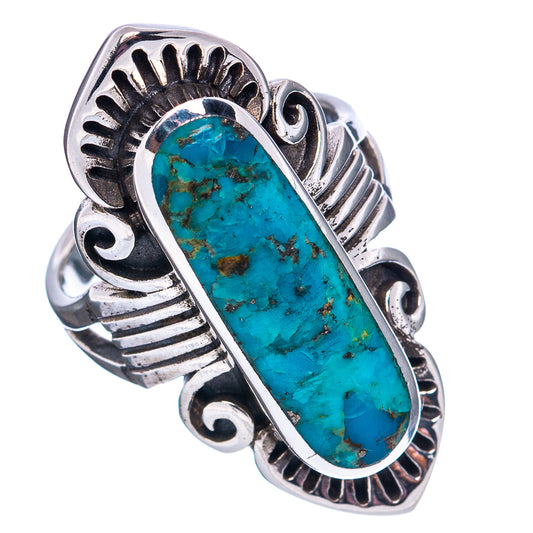 Sterling silver turquoise oval ring with carved bezel and dark etched band