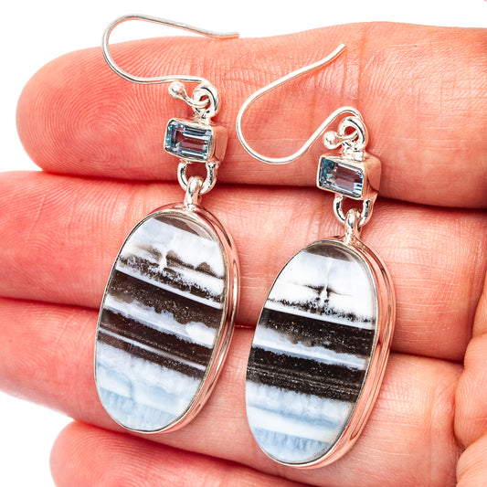 Sterling silver dangle earrings with blue topaz squares and oval striped cabochons