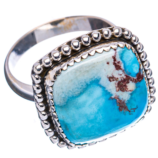 Turquoise cabochon oval ring with beaded border and sterling silver band