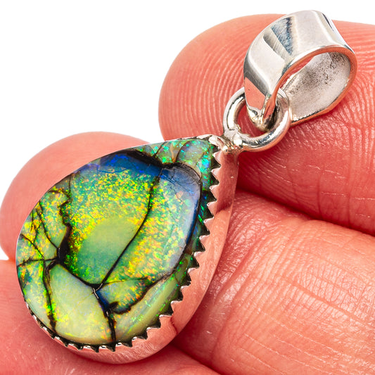 Opal and sterling silver pendant with oval rainbow gemstone and scalloped bezel