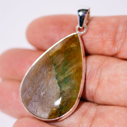 Teardrop moonstone and chrysoprase pendant in a sterling silver setting