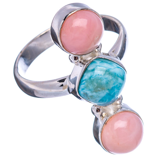 Sterling silver three-stone ring with two oval pink opal cabochons and one oval blue larimar