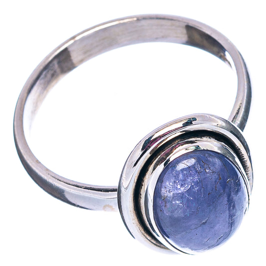 Sterling silver tanzanite ring with oval blue stone in raised double bezel
