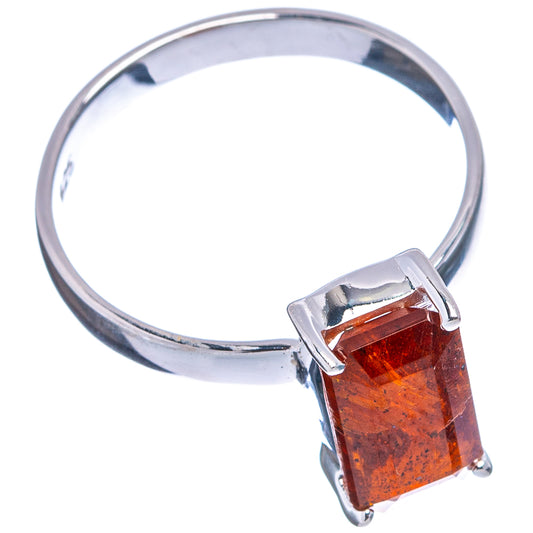 Sterling silver kyanite ring with rectangular orange stone, raised prong setting