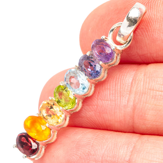 Sterling silver chakra pendant with five colorful gemstone beads in a prong row