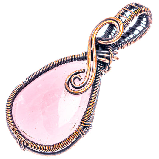 Oxidized copper wire-wrapped rose quartz teardrop pendant with coiled frame