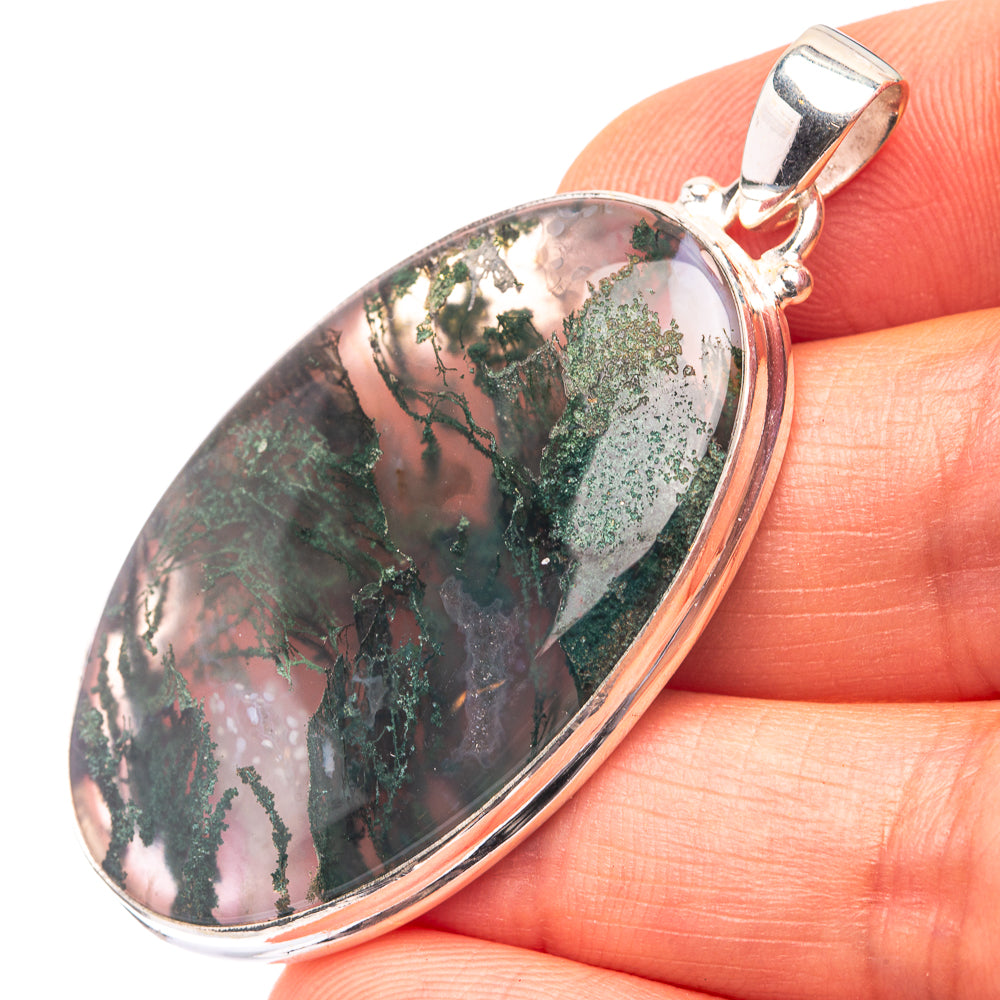 Sterling silver pendant with oval moss agate cabochon, green dendrite patterns