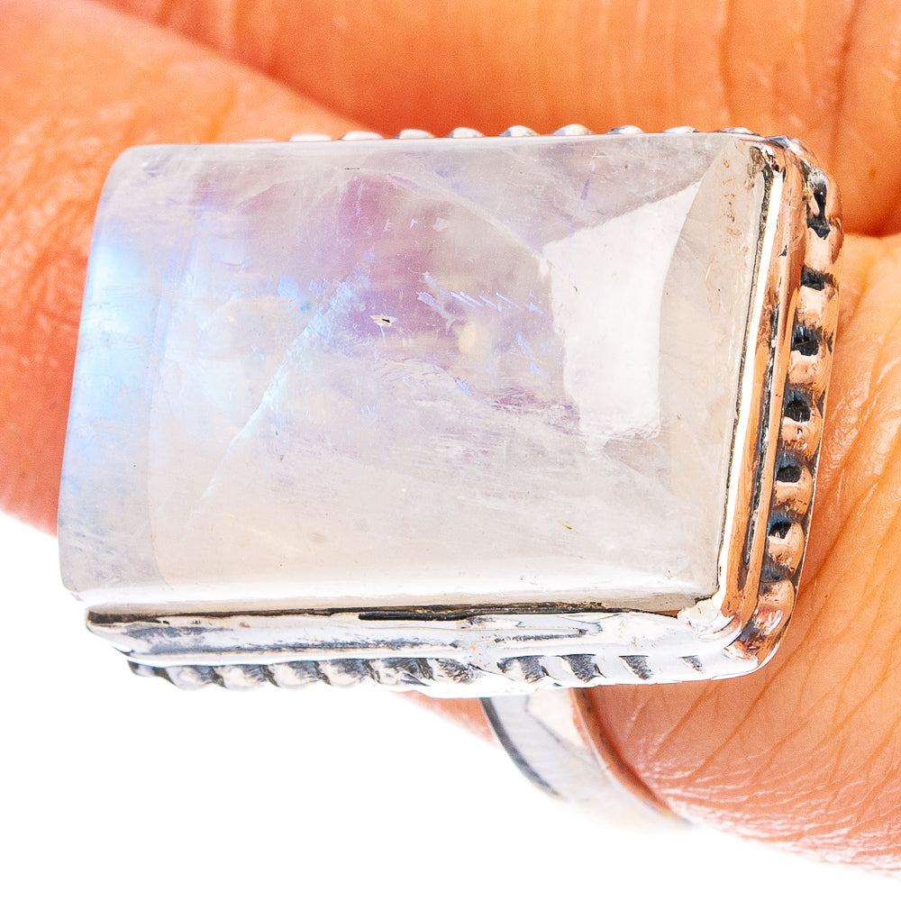 Sterling silver ring with large rectangular iridescent moonstone centerpiece