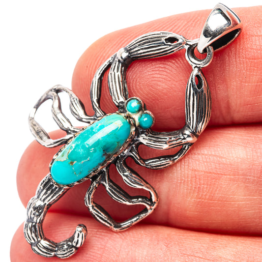 Turquoise scorpion pendant, .925 sterling silver with oval turquoise stone and bead highlights.