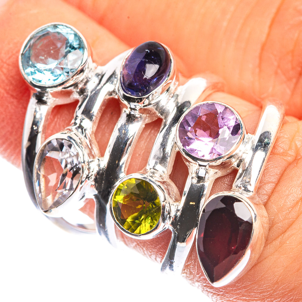 Sterling silver ring with round blue, amethyst purple, peridot green, and garnet red stones