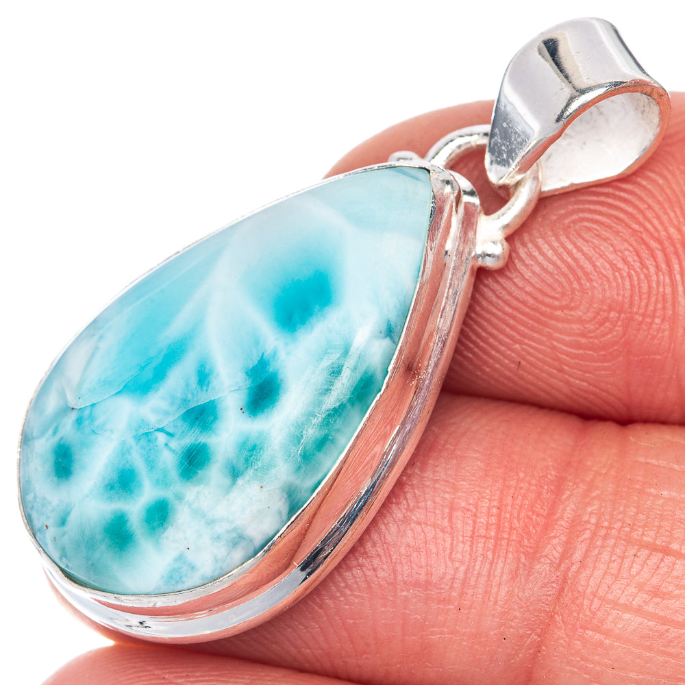 Larimar teardrop pendant close-up, 925 silver setting and bail, turquoise-blue stone