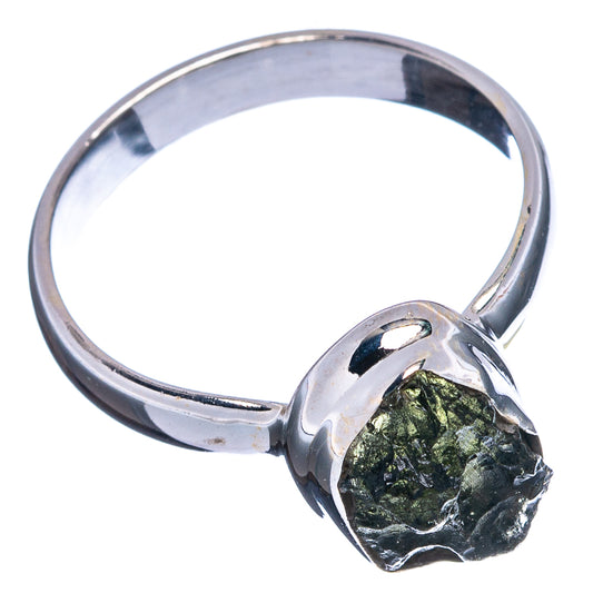 Sterling silver moldavite ring, size 7.5, dark green stone bezel on silver band side view.