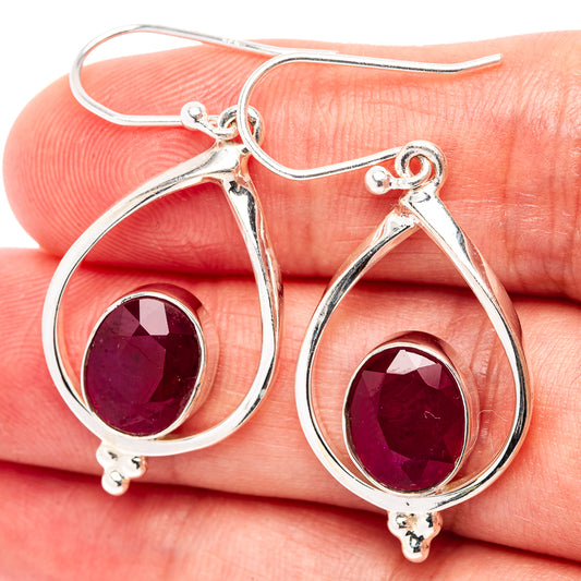 Sterling silver teardrop earrings with ruby-red glass-filled stones