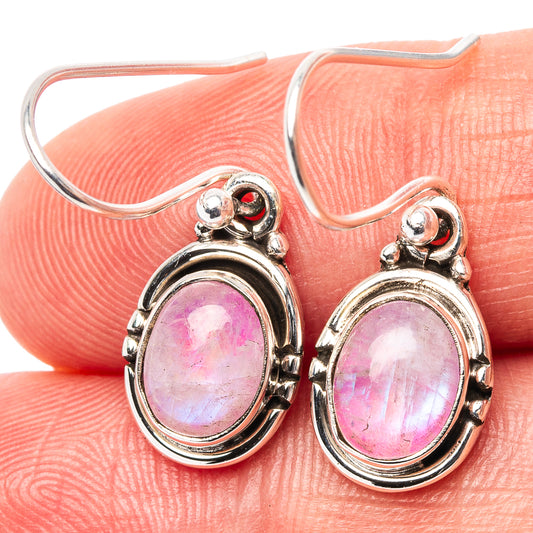 Pink moonstone drop earrings in .925 sterling silver, oval cabochon with ornate bezel