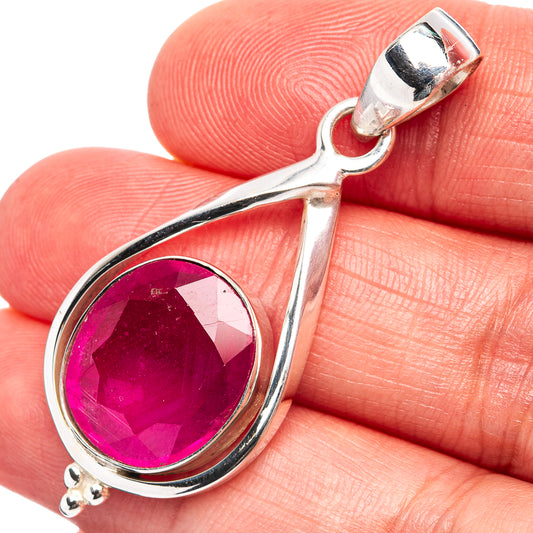 Sterling silver teardrop pendant with oval pink-red gemstone and top bail