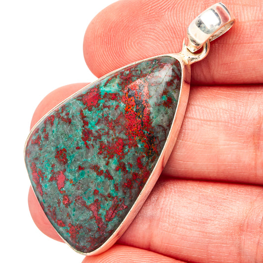 Sterling silver teardrop pendant with red and green speckled stone bezel setting