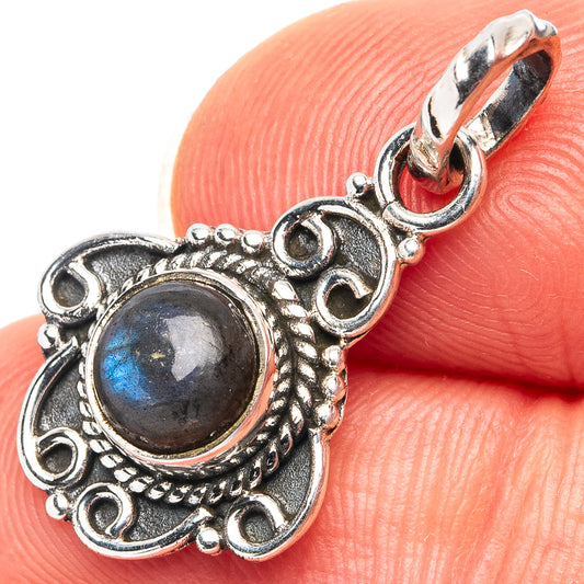 Sterling silver labradorite pendant with round blue flash gemstone and ornate bezel