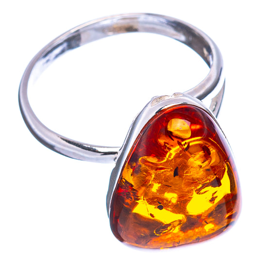 Oval honey amber stone bezel-set on .925 sterling silver band ring, adjustable