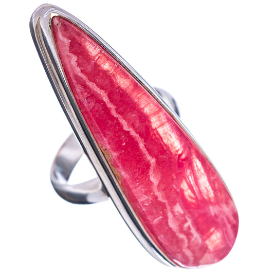 Sterling silver ring featuring oval pink rhodochrosite cabochon, side angle