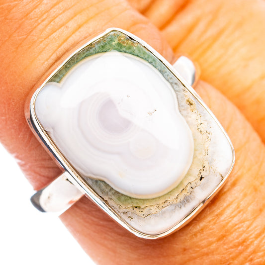 Size 8 sterling silver ocean jasper ring with oval bezel-set white and green cabochon