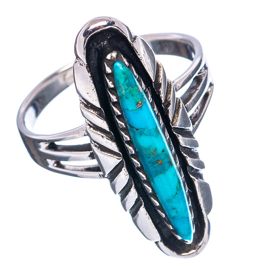 Turquoise oval ring in .925 sterling silver with black bezel and leaf accents on band
