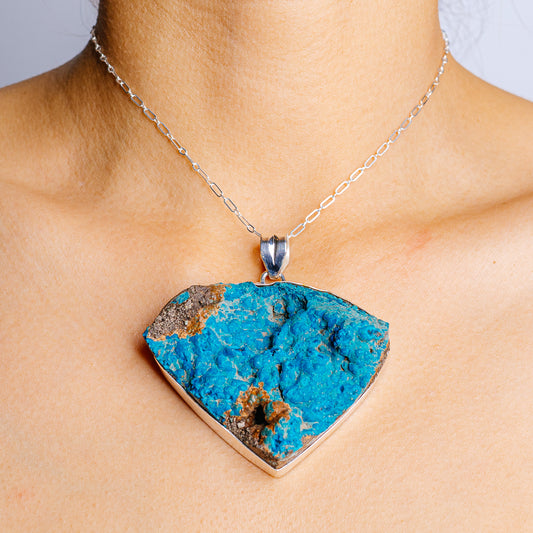 Sterling silver pendant with blue chrysocolla triangular stone and bail