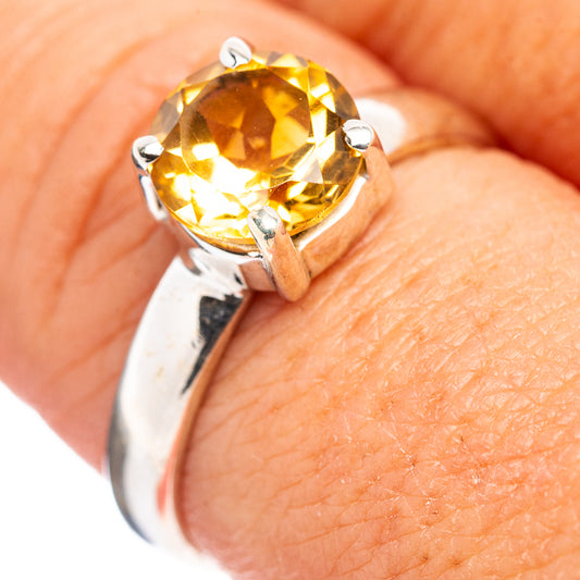 Citrine gemstone sterling silver ring with round yellow stone in prong setting