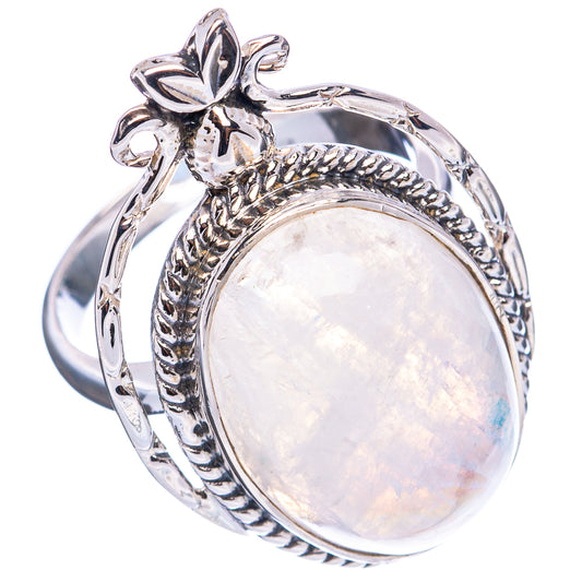 Sterling silver moonstone ring with oval rainbow opal and floral side details
