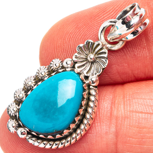 Sleeping Beauty turquoise pendant in .925 sterling silver, teardrop bezel with flower details