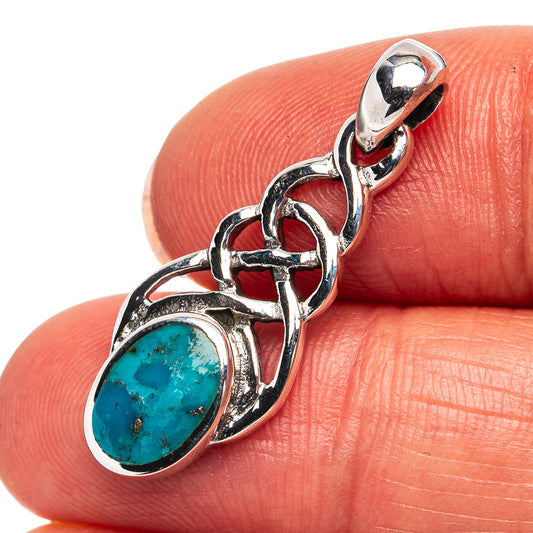 Turquoise cabochon pendant in 925 sterling silver with ornate link setting