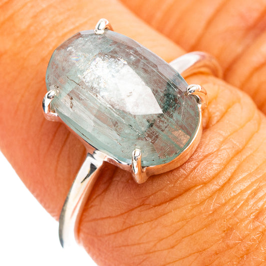 Faceted aquamarine ring with oval bezel, .925 sterling silver band, size 7