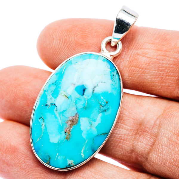 Oval Kingman turquoise pendant with .925 sterling silver bezel and loop bail