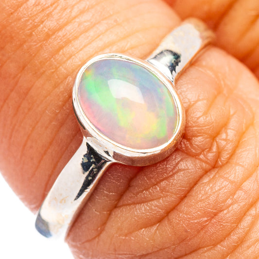 Sterling silver opal ring with oval Ethiopian opal on a split band