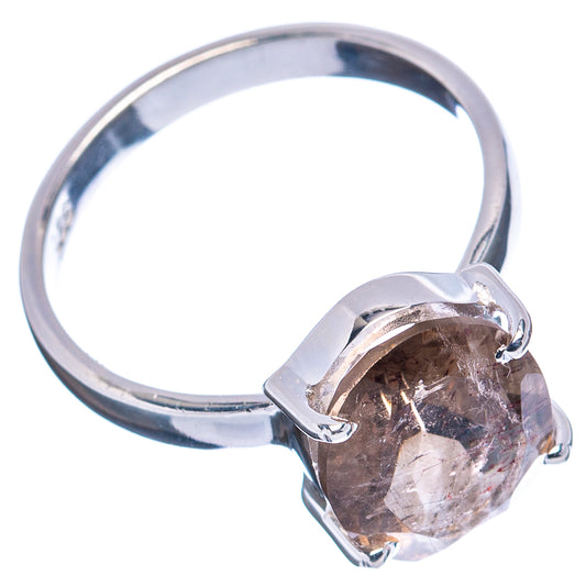 Sterling silver ring with raised oval Super Seven gemstone and four claw prongs