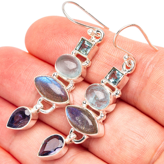 925 sterling silver earrings with oval and pear blue gemstones, drop style