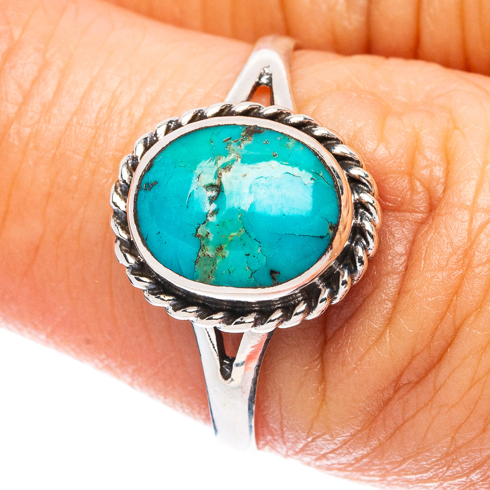 Sterling silver oval turquoise ring with ornate rope bezel, size 7.75