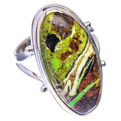 Sterling silver ring with oval green-brown stone and raised bezel setting