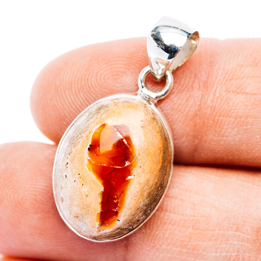 Oval fire opal pendant in .925 sterling silver bezel, amber orange translucent stone