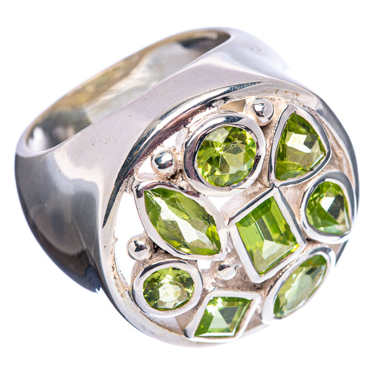Sterling silver peridot ring angled view with green round and square stones