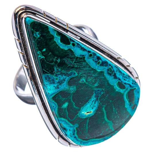 Sterling silver ring with oval green-blue marbled stone and openwork side frame.
