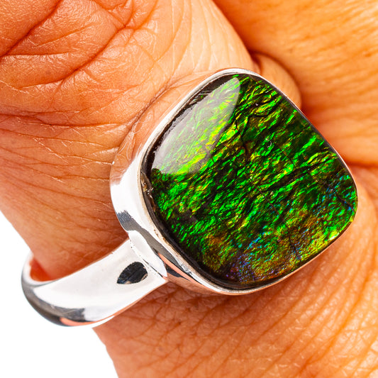 Sterling silver ammolite ring with green iridescent teardrop stone, bezel setting
