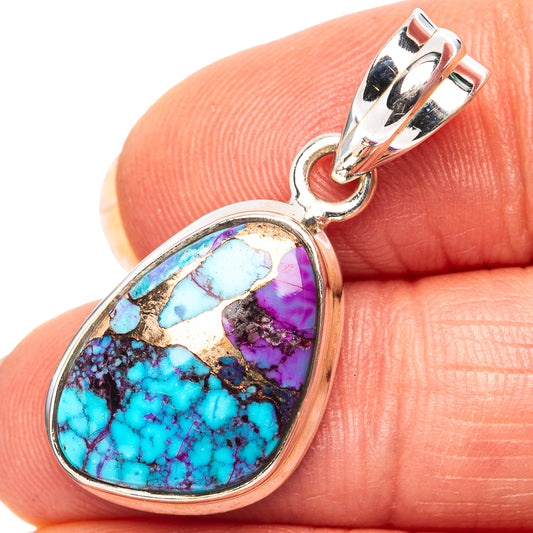 Sterling silver teardrop pendant with turquoise, purple, and gold-tone stone inlay