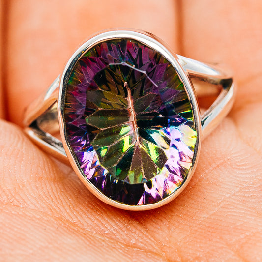 Oval mystic topaz ring in .925 sterling silver with iridescent faceted center, size 7