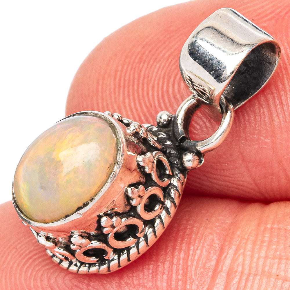 Opal pendant charm in 925 sterling silver, round cabochon, ornate floral setting