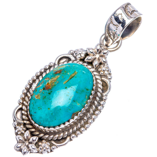 Turquoise oval cabochon sterling silver pendant, detailed floral beading and frame