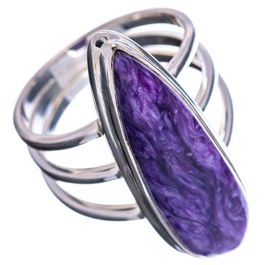 Sterling silver ring with oval purple charoite cabochon and open band side view