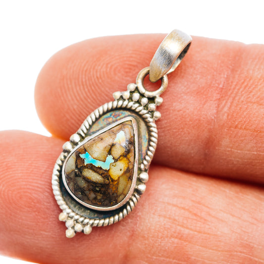 Sterling silver pendant with oval Royston turquoise inlay and ornate rope bezel