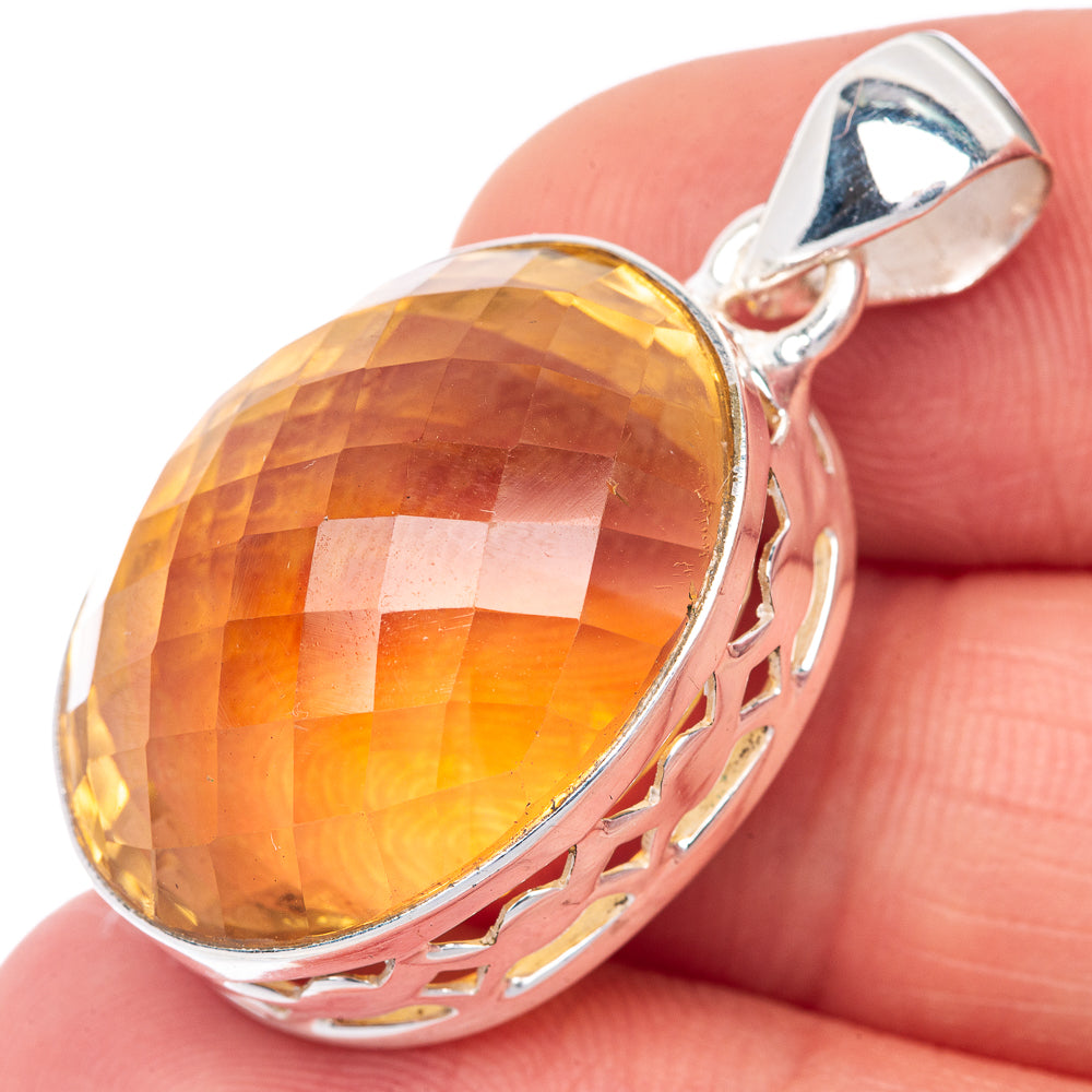 Oval faceted citrine pendant in 925 sterling silver with openwork halo setting
